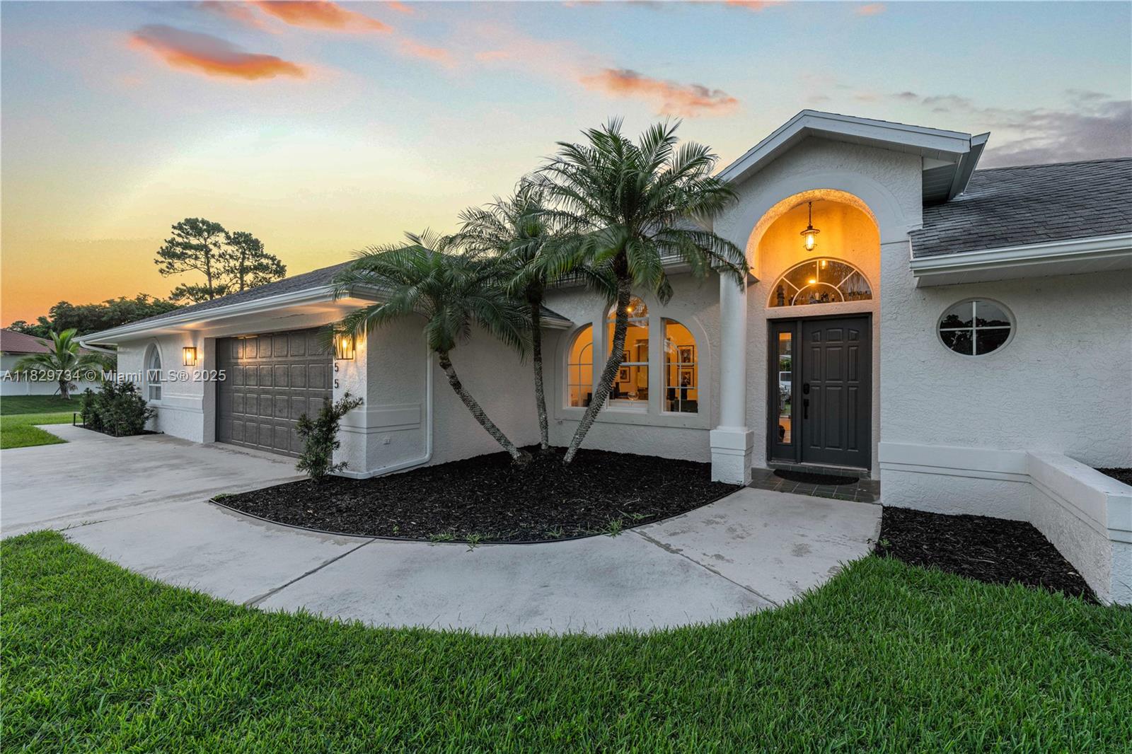 Welcome to this beautifully updated 4-beds,3-bath home situated on a spacious half-acre lot in a quiet and desirable Port St. Lucie neighborhood. Property features open layout with upgrades, including a brand-new custom butler pantry, fully renovated bathroom, revamped custom closet, and luxury vinyl flooring throughout the entire home. Property includes a private in-law suite complete with its own full bathroom and private entrance. Additional features include a mudroom, modern lighting fixtures, fresh interior and exterior paint, a brand-new water heater, new washer and dryer, and maintained landscaping that boosts curb appeal. Located just minutes from I-95, Florida’s Turnpike, and only 5 minutes from Cleveland Clinic Hospital with growing neighborhood near traditions.