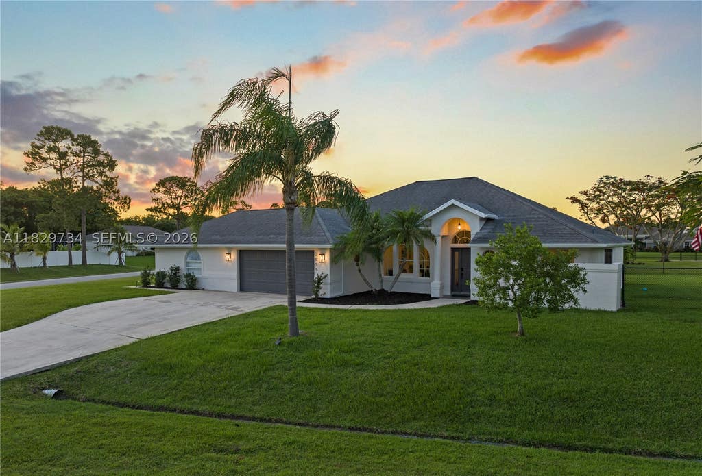 Photo of 2055 SW Aaron Ln, Port St Lucie, FL 34953 (MLS # A11829734)