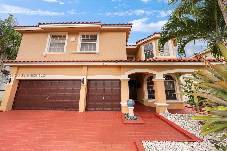 Located in the desirable gated community of Pembroke Shores, this spacious 2-story home offers 6 bedrooms, 4 full baths, and endless potential with minimal remodeling. Features include soaring ceilings, grand entry, open kitchen with center island, formal dining, and a first-floor bedroom with full bath. Upstairs, the primary suite boasts a large tiled terrace overlooking the backyard—a true blank canvas. Enjoy a 3-car garage, laundry room with sink, new roof (2019) and HVAC (2020). Ideally situated near I-75, hospitals, schools, parks, golf courses, shopping, and dining. A fantastic opportunity to create your dream home in one of Pembroke Pines’ premier communities!