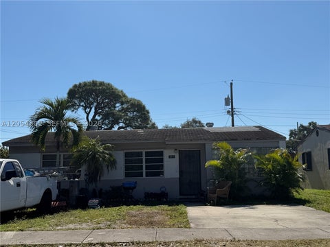 Photo of 1828 NW 152nd St, Miami Gardens, FL 33054 (MLS # A12054302)