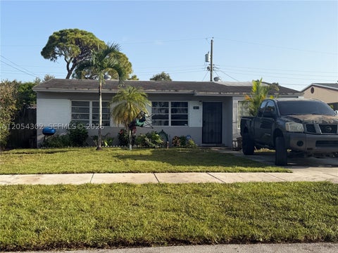 Photo of 1828 NW 152nd St, Miami Gardens, FL 33054 (MLS # A12054302)