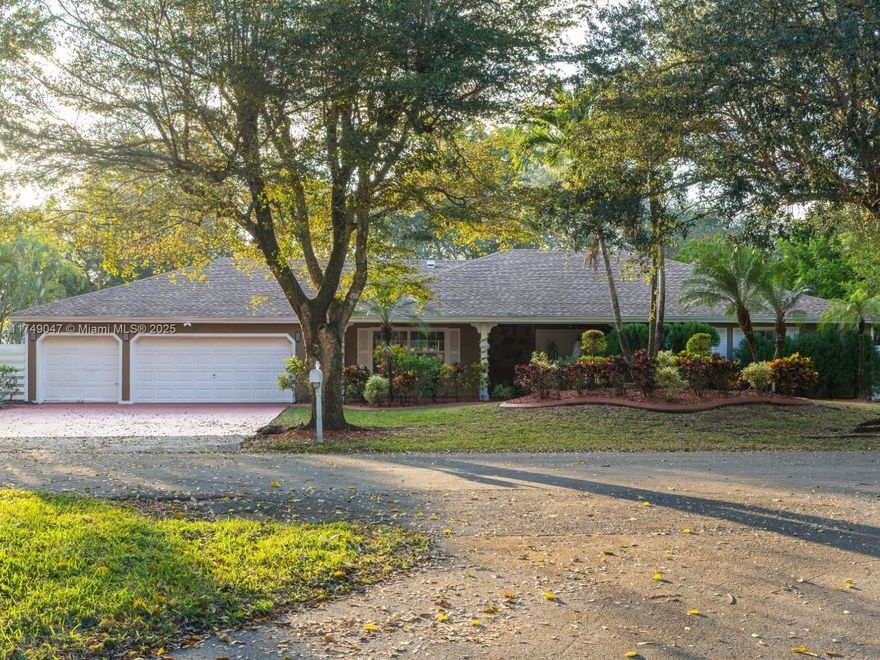 Your own Oasis residence waits for you in the desirable community of Country Walk. Absolutely beautiful and with elegant finishes, this exquisite home offers a unique floor plan; with 3 bedrooms and 2 bathrooms on one side of the house; and on the other side the In-Law Quarters with 1 bedroom, 1 bathroom and a den, generous open space for the kitchen-family-area, formal dining room, and formal living room. Nestled in a 14,850 SqFt lot of luscious tropical landscape surrounding the property, a designated and large outdoor space to enjoy with seating areas in the front covered porch and a back covered and open patio that includes summer kitchen, pool and cabana bathroom. Neighborhood Club House, 24hrs security patrol, market square for the community and an A rated school among others.