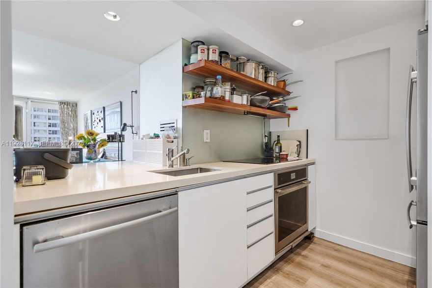 Step into a sun-drenched corner unit. This home features a state-of-the-art open kitchen with floor-to-ceiling cabinetry, an expansive master suite, beautiful bathrooms, abundant built-in closets, impact windows, and a full-size washer & dryer. Live like you’re on vacation with resort-style amenities, including a cutting-edge fitness center, bayside pool, jacuzzi, convenience store, 24-hour concierge & valet, and cable/internet included.