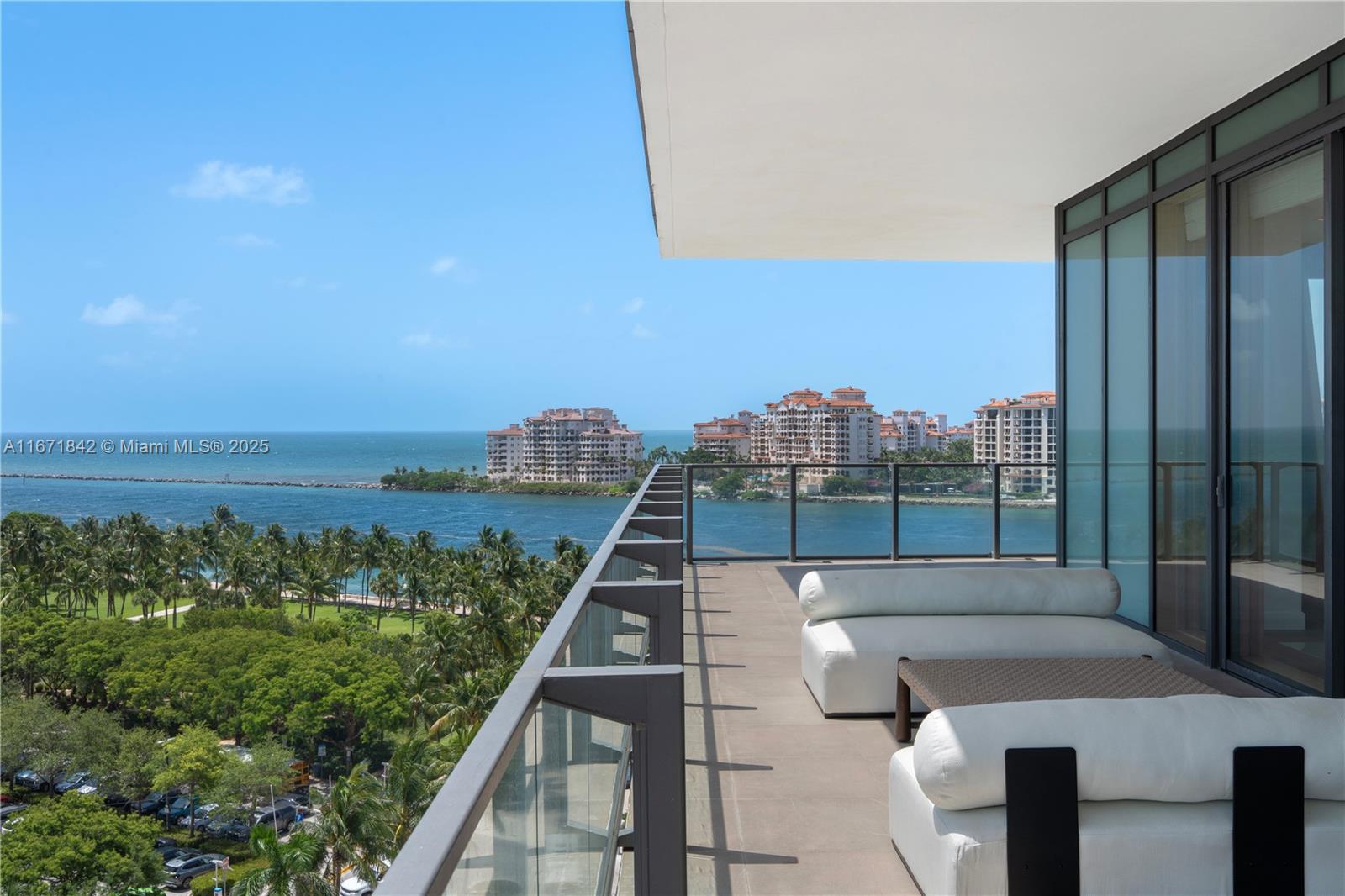 Crafted by the acclaimed designer Luis Bustamante, this turnkey residence at the prestigious Apogee presents a sophisticated living experience with sweeping views of the ocean, Fisher Island, and the city skyline. As you enter, you'll discover a spacious, light-filled floor plan featuring 4 bedrooms, 3.5 bathrooms, and a private media room. The gourmet kitchen is equipped with state-of-the-art appliances and opens to a terrace with a gas grill for al fresco dining. Apogee offers unparalleled amenities, including a fitness center, pool, and 24-hour concierge, ensuring luxury and peace of mind. Situated in the coveted South of Fifth neighborhood, this residence is just moments from Miami’s premier dining destinations.