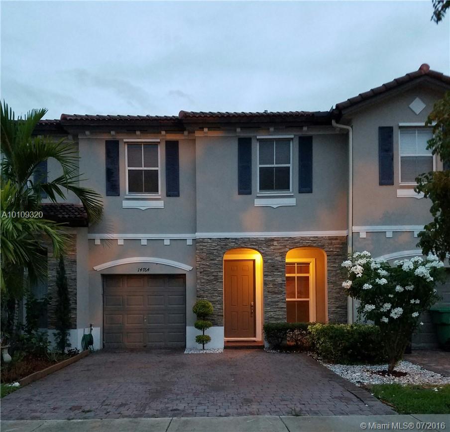 Two story townhouse, only 4 years old, in great west Kendall location. Minutes from shopping, restaurants and schools. Spacious interior with lots of storage, ceramic floors throughout, new washer and dryer, great converted garage space and beautiful lakefront patio area.