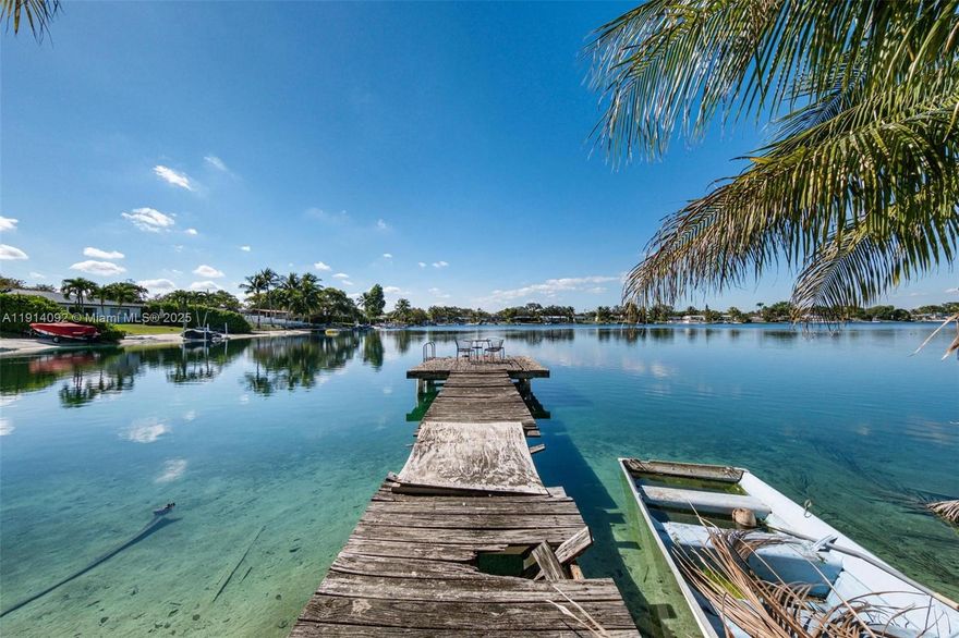 This is a rare opportunity to build a brand-new home on the highly coveted blue lake, one of Miami’s most desirable and exclusive motorized lakes. Situated on a generous 10,490 sq ft lot, the property offers expansive lake frontage with some of the most breathtaking sunset views anywhere in the city. The sparkling blue water creates a tranquil backdrop & provides direct access to boating, jet skiing, fishing, paddleboarding, and more—right from your own backyard. Whether you envision a modern estate or a serene waterfront retreat, this property offers endless possibilities to create your dream home while enjoying unmatched natural beauty and year-round outdoor living. Shown by appointment only, develop the existing home or build your dream in paradise!