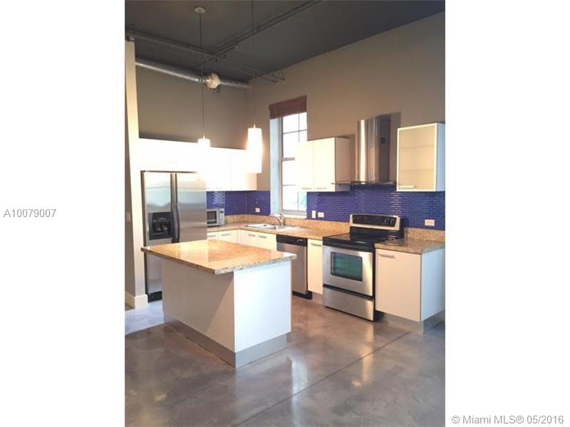 Great Corner Unit loft with a Huge Patio close to Downtown Fort Lauderdale. the unit features polished concrete flooring, 12 foot ceilings , stainless steel appliances, exposed duct work, custom walk in closet, etc. Unit has a custom built glass wall that separates the bedroom from the living area. building offers rooftop pool, lounge area with grill and gym facilities. Washer and dryer in unit.