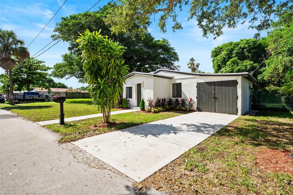 Photo of 261 NW 2nd Ct, Deerfield Beach, FL 33441 (MLS # A11891568)