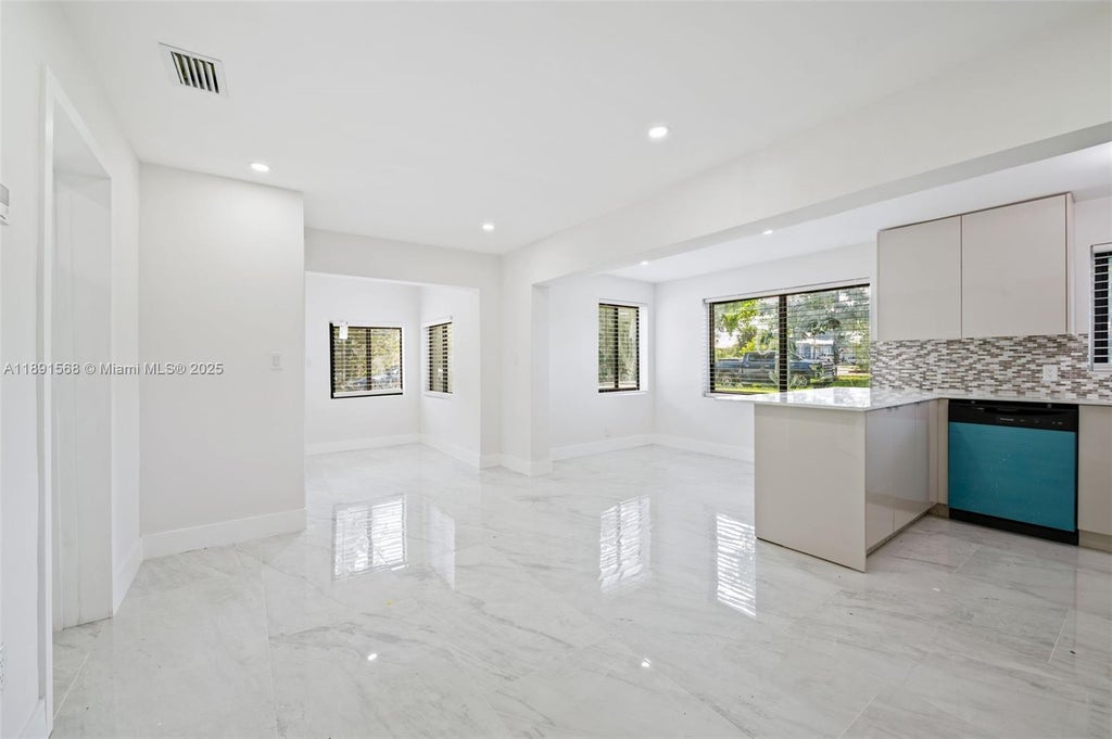 Photo of 261 NW 2nd Ct, Deerfield Beach, FL 33441 (MLS # A11891568)