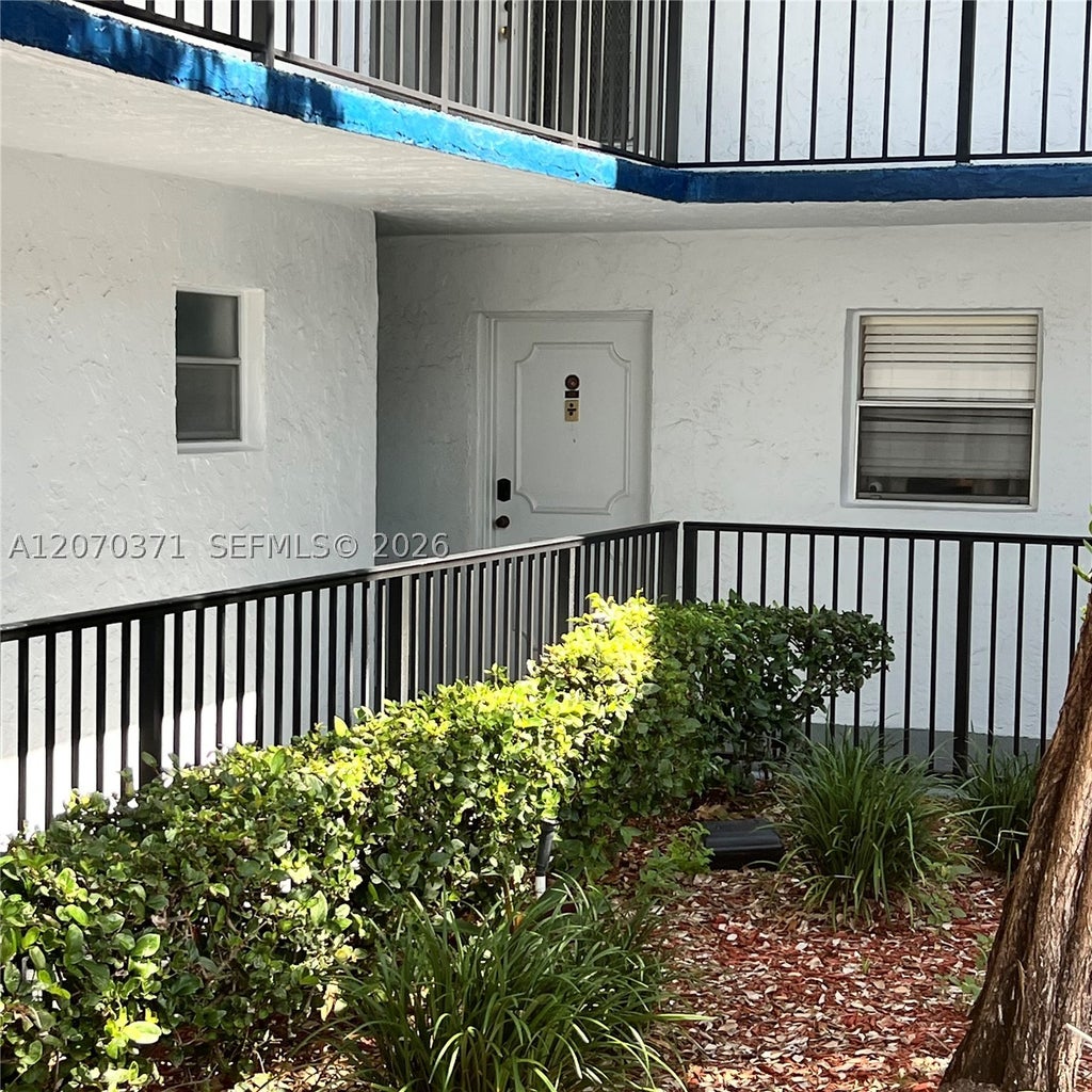 Photo of 3170 Holiday Springs Blvd #6-105, Margate, FL 33063 (MLS # A12070371)