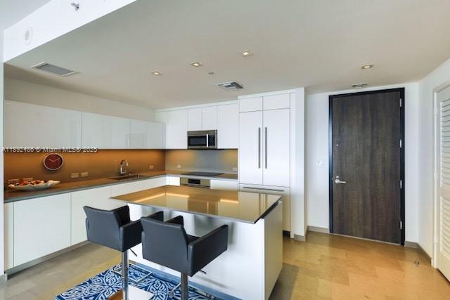 REACH CONDO - Residential Lease