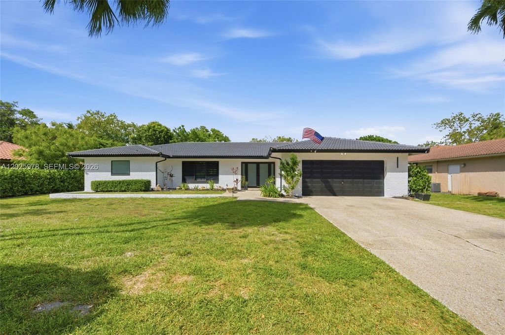 Photo of 9935 Ramblewood Dr #9935, Coral Springs, FL 33071 (MLS # A12025978)
