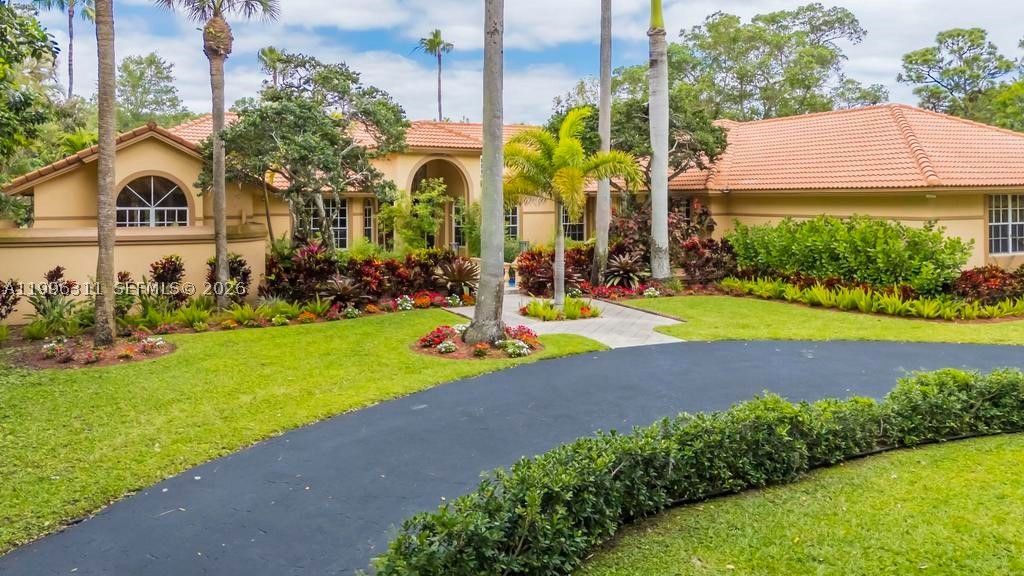 Photo of 5328 E Leitner Dr, Coral Springs, FL 33067 (MLS # A11996311)