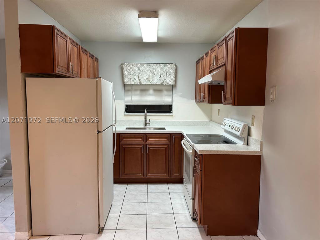 Photo of 1925 Madison St #14, Hollywood, FL 33020 (MLS # A12071972)