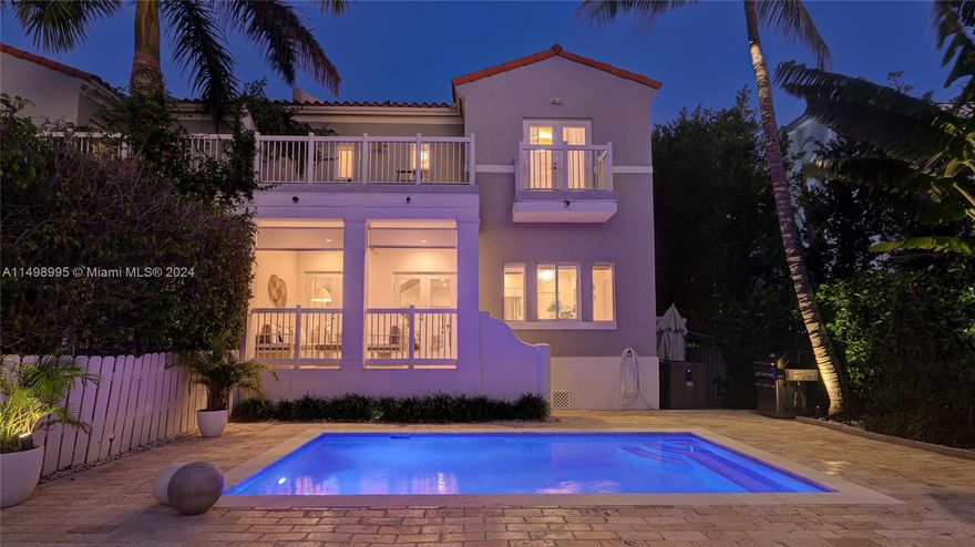 Beautiful and totally remodeled 4 bedrooms 3 baths townhouse for sale on the 6th block of Fernwood Rd. From the ample driveway you are led to a set of steps towards an open cover porch as preview to the main door. A modern glass stairwell serves as a division between the formal living, family, dining and fully upgraded kitchen. A bedroom and full bath complete the living area of the first floor. A lovely covered terrace, ample patio & recently redone private pool, round up the back exterior of the house. The second floor features 2 more bedroomss, bath and master suite. From the 2 bedrooms you can access a terrace, for ampleness and privacy. Impeccacle finishes, impact windows, soothing colors, & nice landscape complete this recently painted townhouse suitable to the most exquisite taste.