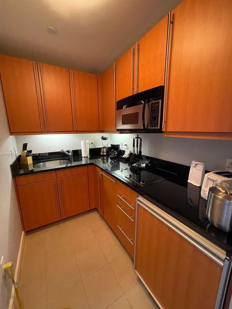 MILLENNIUM TOWER CONDOMIN - Residential