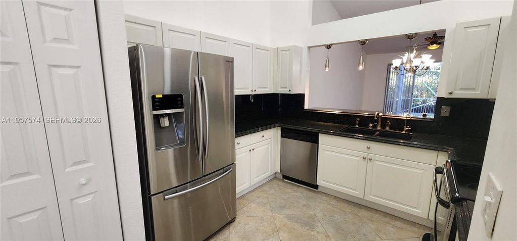 Photo of 7400 S Aragon Blvd #3, Sunrise, FL 33313 (MLS # A11957574)