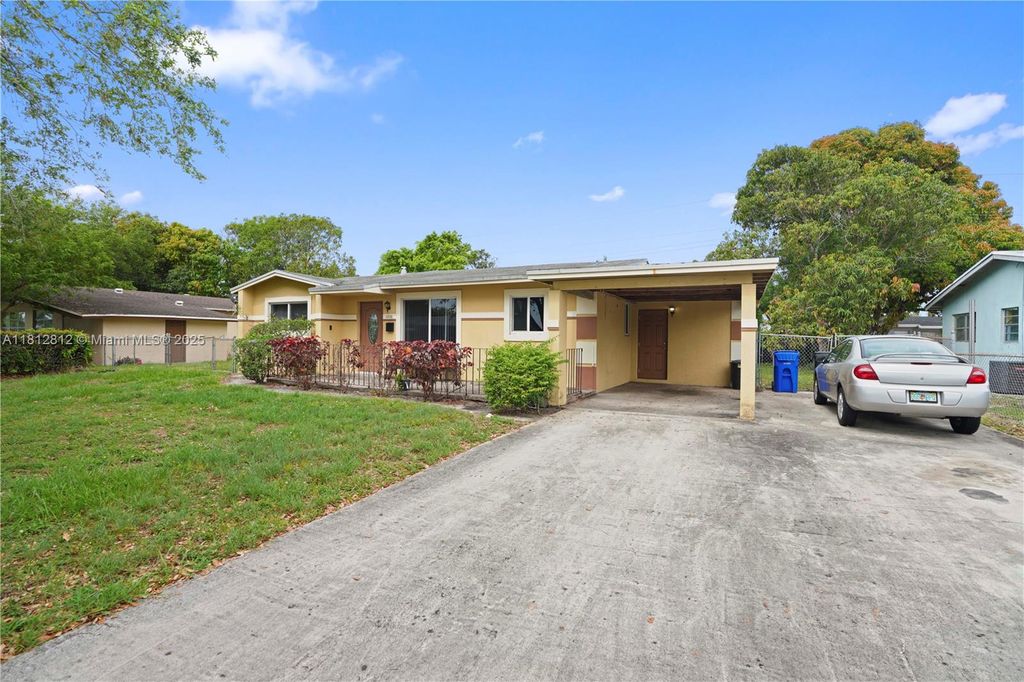 Photo of 1731 NW 27th Ter, Fort Lauderdale, FL 33311 (MLS # A11812812)