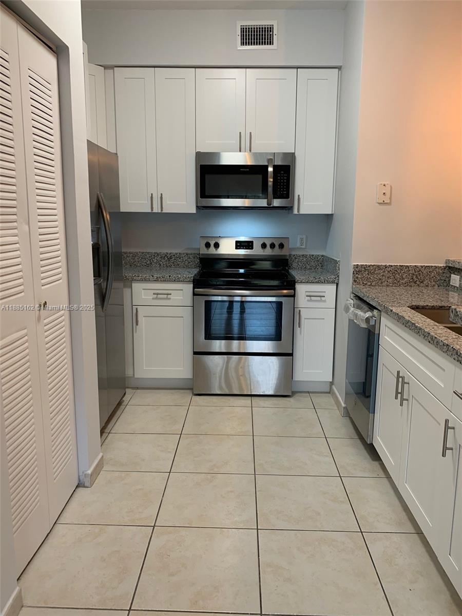 PALM GARDENS AT DORAL CON - Residential