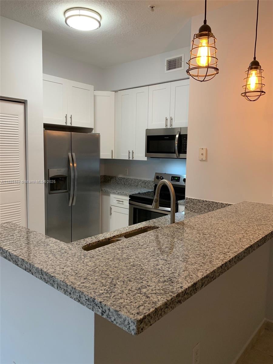 PALM GARDENS AT DORAL CON - Residential