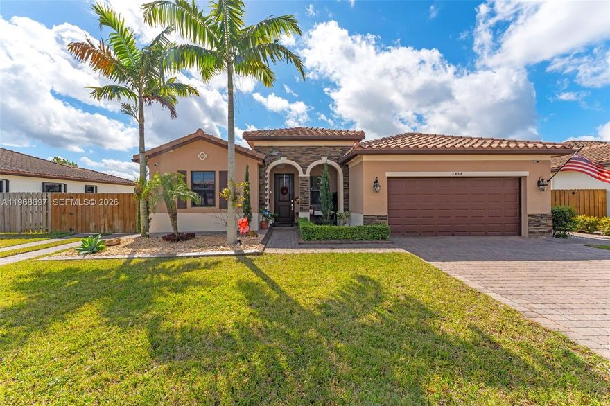 Welcome to this Beautiful 4-bedroom, 3-bathroom residence located in the gated community of Portovita in Homestead. Ideally positioned just minutes from the Florida Turnpike, Baptist Hospital, shopping centers, and dining options, this home offers both comfort and convenience in a well-established neighborhood.
The thoughtfully designed layout provides spacious living areas, creating an inviting atmosphere for everyday living and entertaining. Tile flooring throughout the main areas adds durability and style, while the open-concept kitchen flows seamlessly into the family and dining spaces, making gatherings effortless. The primary suite serves as a private retreat with generous closet space and a well-appointed ensuite bath. Three additional bedrooms and two full bathrooms offer flexibility for guests, home office space, or multi-generational living.
Step outside to enjoy paved front and backyard areas, gutters for added protection, and a fully fenced yard ideal for outdoor enjoyment. Residents of this gated community enjoy beautifully maintained surroundings and access to amenities including a pool, clubhouse, fitness center, and playground.  A wonderful opportunity to own a spacious home in one of Homestead’s most desirable communities.