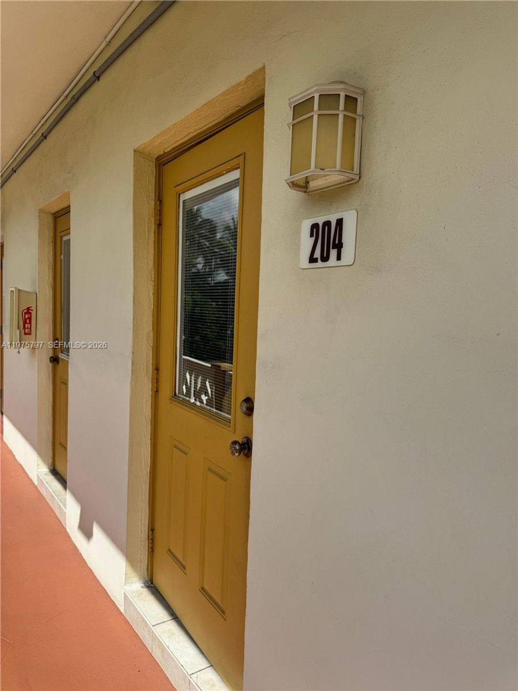 Photo of 5121 W Oakland Park Blvd #204, Lauderdale Lakes, FL 33313 (MLS # A11975797)