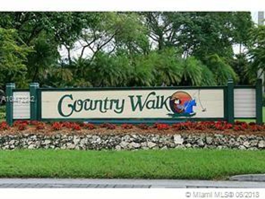 Beautiful Corner Country Walk Town House, one story,  spacious 2 Beds 2 Baths, ceramic floor, very well maintained, screened terrace, 2 year AC Unit, Hurricane accordion shutters.  Enjoy the Country Walk Facilities,  Pool, Tennis, BBQ Picnic Area, Jogging Paths, Bike, Security, excellent and safe area for children.  Close to shopping.  EASY TO SHOW