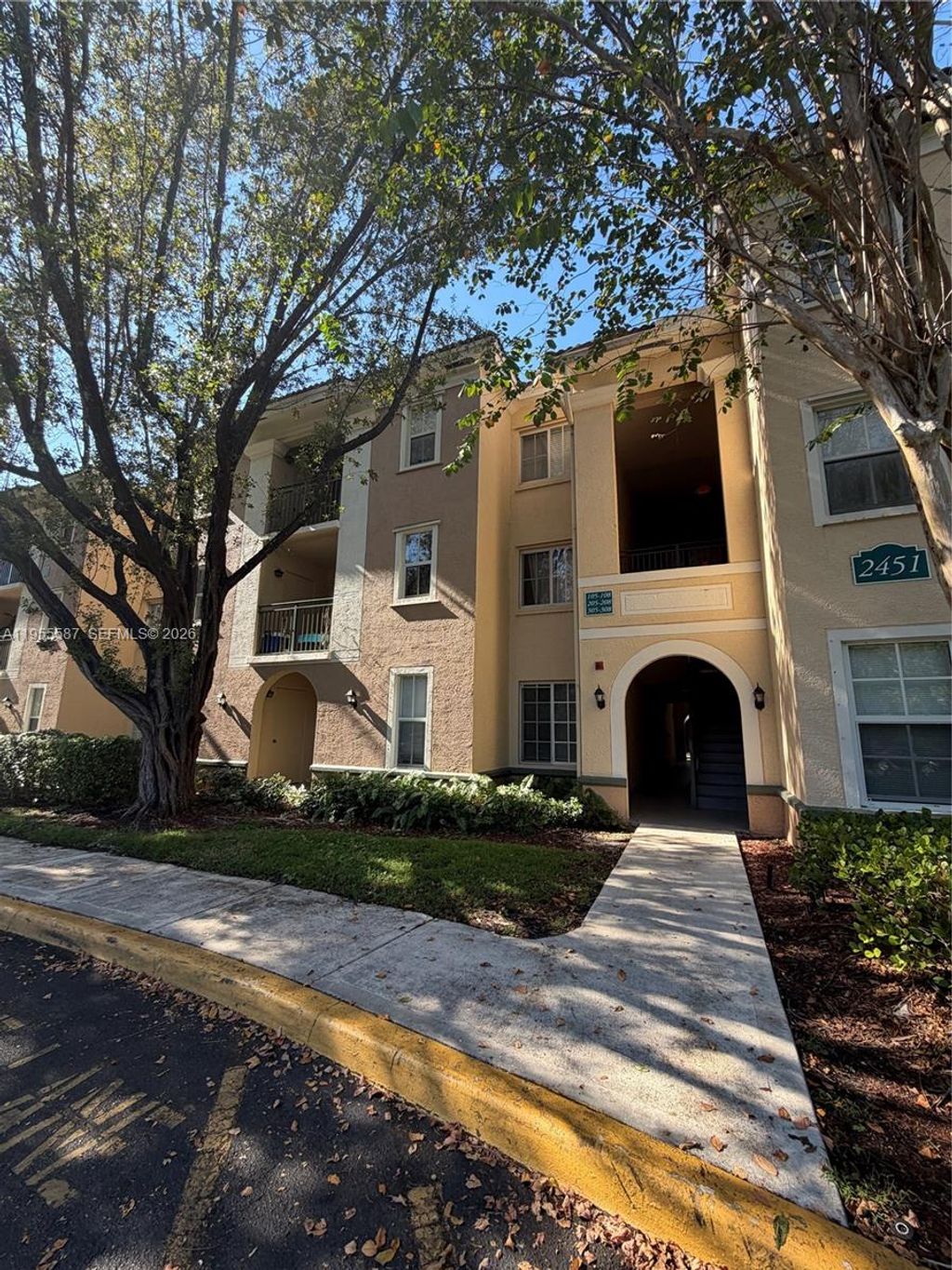 Photo of 2451 Centergate Dr #106, Miramar, FL 33025 (MLS # A11955587)