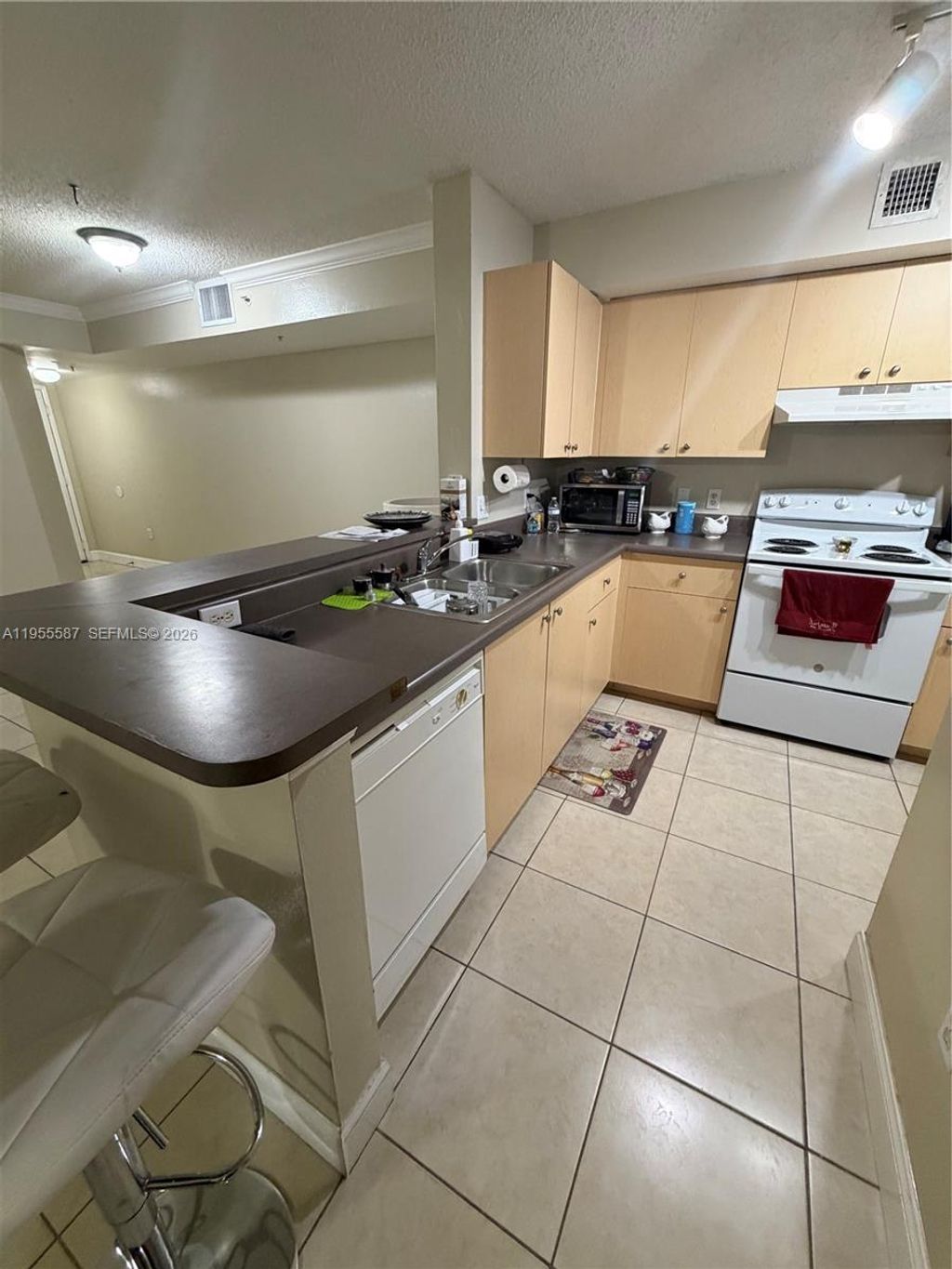Photo of 2451 Centergate Dr #106, Miramar, FL 33025 (MLS # A11955587)