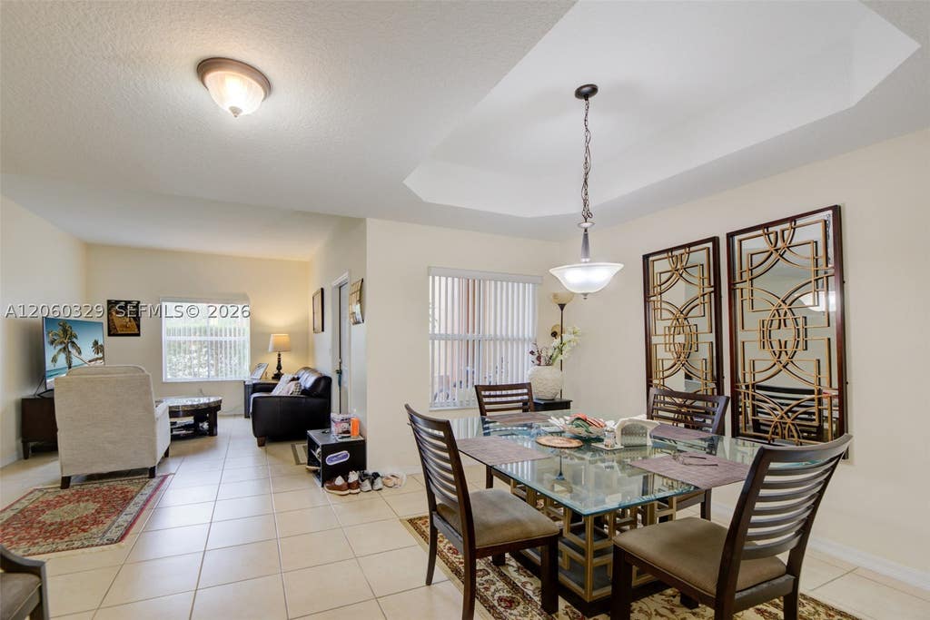 Photo of 806 SW 143rd Ter, Pembroke Pines, FL 33027 (MLS # A12060329)