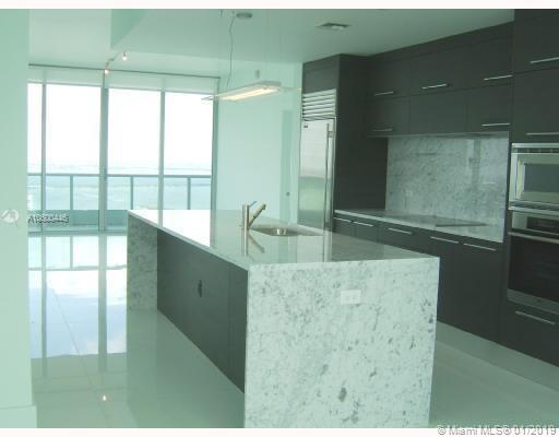 Great view of Sunset and Biscayne Bay & city of Miami and Miami beach. 3 big terraces. 2 beds and 2 and a half baths.24x24 white porcelain throughout the unit and terraces. Kitchen with carrara marble counter tops,Italian cabinetry, Miele and SubZero ref.10' ceilings. Custom closets in all 2 bedroom . Window treatments everywhere and blinds in bedrooms.Amenities includes 2 pools overlooking the bay, spa, private movie theater. EASY TO SHOW