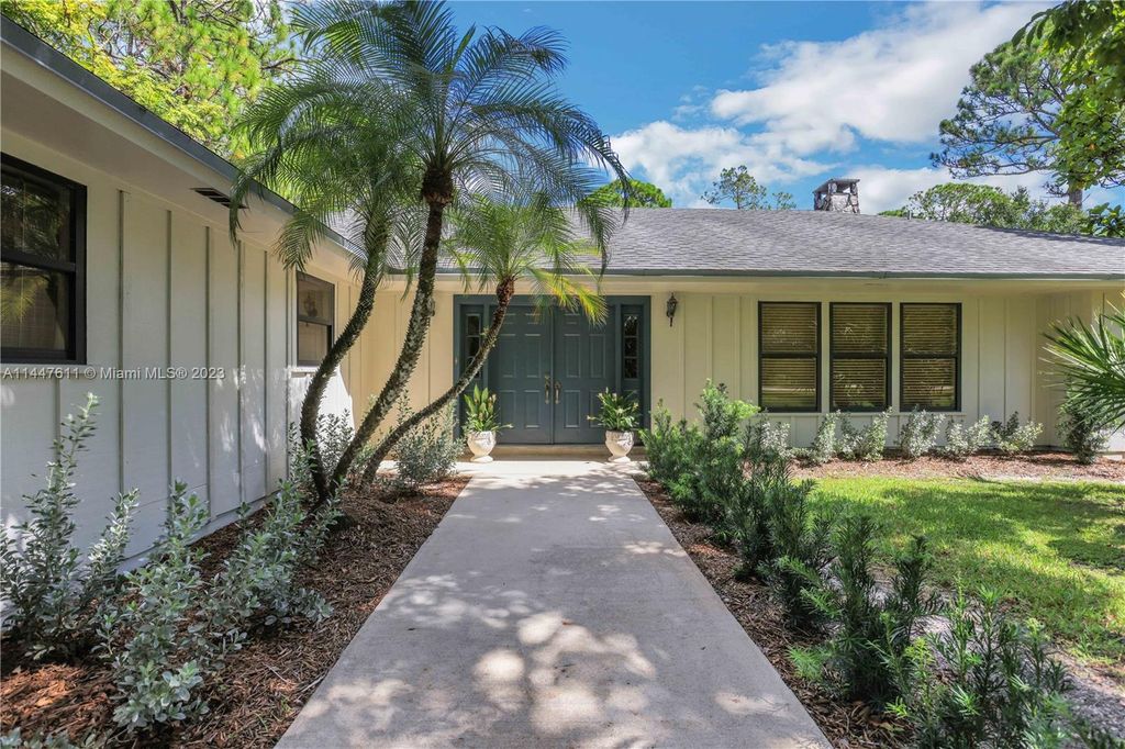 Photo of 12215 N 174th Pl N, Jupiter, FL 33478 (MLS # A11447611)