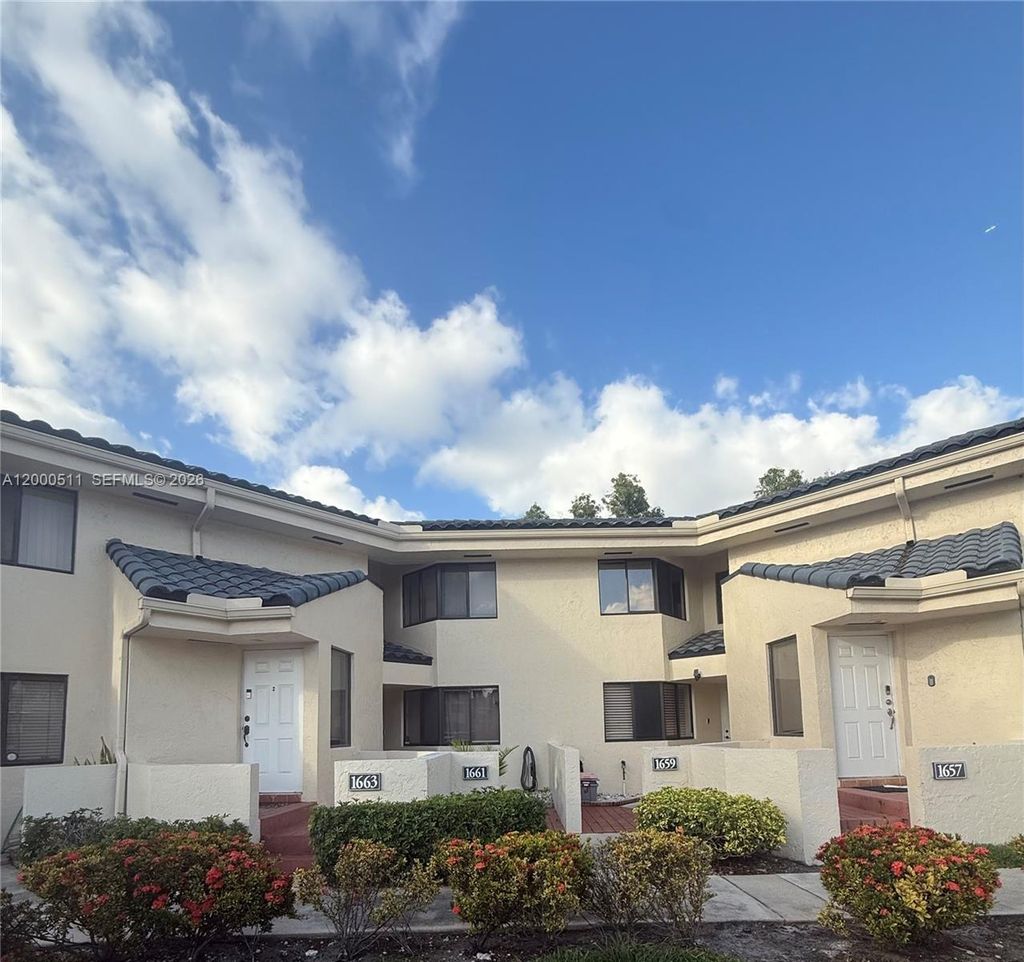 Photo of 1661 NW 81st Way #1661, Plantation, FL 33322 (MLS # A12000511)