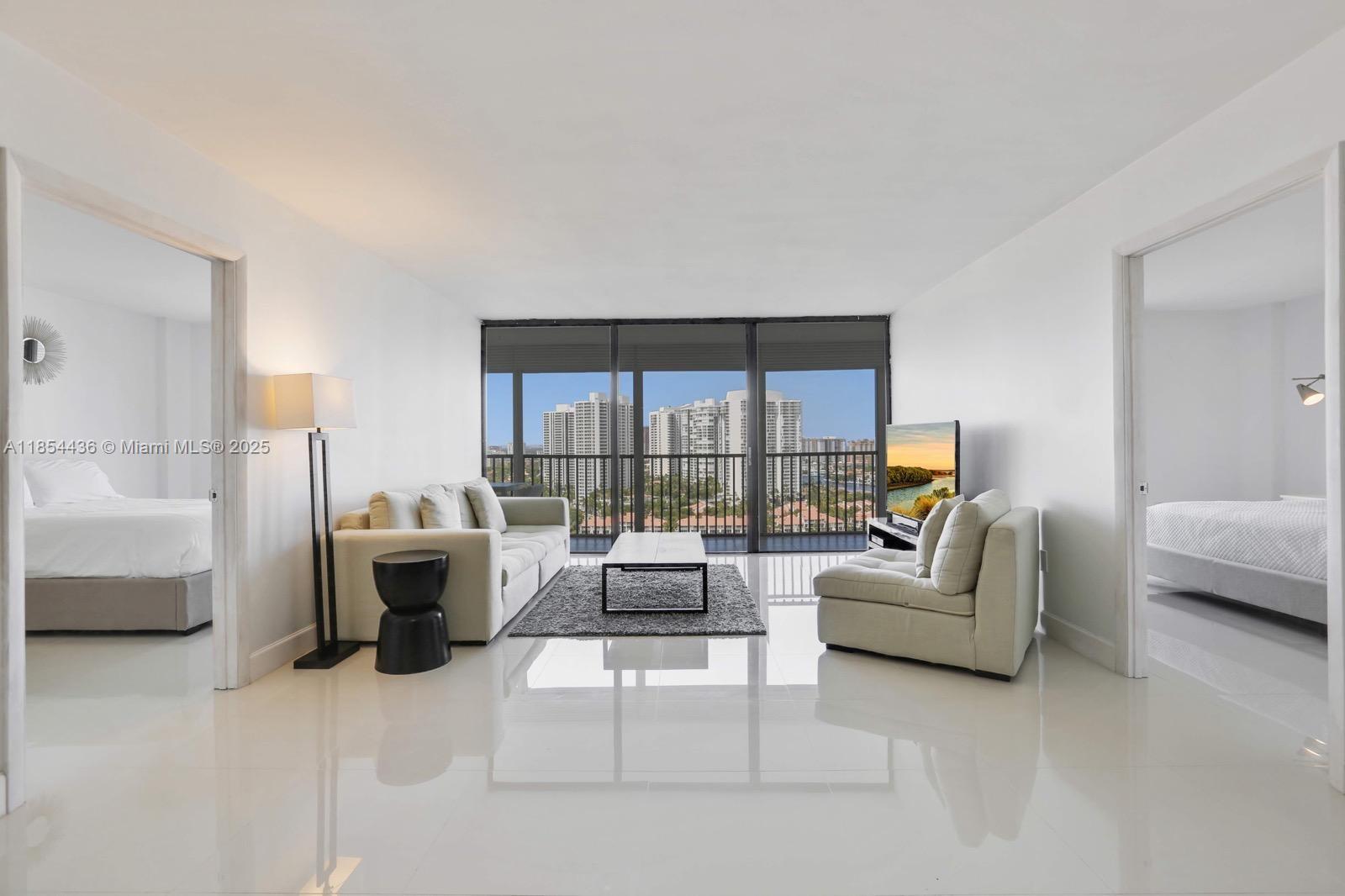 Renovated 2 bedroom unit overlooking breathtaking open canal and ocean views in the heart of Aventura. Enjoy a spacious split floor plan complete with modern finishes such as white tile flooring, large kitchen with stainless steel appliances and tons of cabinetry, front load Bosch washer & dryer and huge primary bath with ample closet space and dual sink vanity. Not pictured: the balcony screen has been removed and is now open with glass railing & unobstructed water views, flooding the unit with natural light. Flamenco Tower is host to luxury amenities including spacious pool deck, sauna, fitness center & more! Also an unbeatable location, across the street from Turnberry Country Club, less than 5 minutes to the endless shops & restaurants in Aventura Mall, and 10 min to Sunny Isles Beach