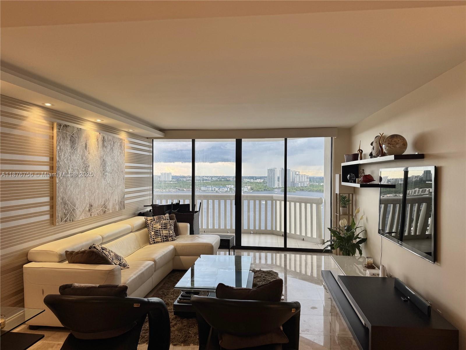 UPDATED & FURNISHED 2 BED /2 BATH UNIT WITH MARBLE FLOORS THROUGHOUT. STAINLESS STEEL APPLIANCES, GRANITE COUNTERTOPS, BEAUTIFUL WATER VIEWS AND SUNSETS FROM THE LARGE TERRACE. INCLUDED IN THE RENT IS PREMIUM CABLE TV, HIGH SPEED WIFI, WATER AND VALET PARKING. SOUGHT AFTER BUILDING WITH REMODELED LOBBY AND COMMON AREAS: LIBRARY, GYM, MOVIE THEATER, CARD AND GAME ROOM. LIVE IN PRESTIGIOUS WILLIAMS ISLAND W/ FULL AMENITIES: 15 TENNIS COURTS, 4 PICKLEBALL COURTS, 3 RESTAURANTS, STARBUCKS, STATE OF THE ART SPA, MARINA, WALK/JOG PATH, KIDS PLAYGROUND, COURTESY BUS, SYNAGOGUE, AVENTURA CHARTER SCHOOLS & MUCH MORE. UNIT CAN BE ALSO BE RENTED FOR THE SEASON