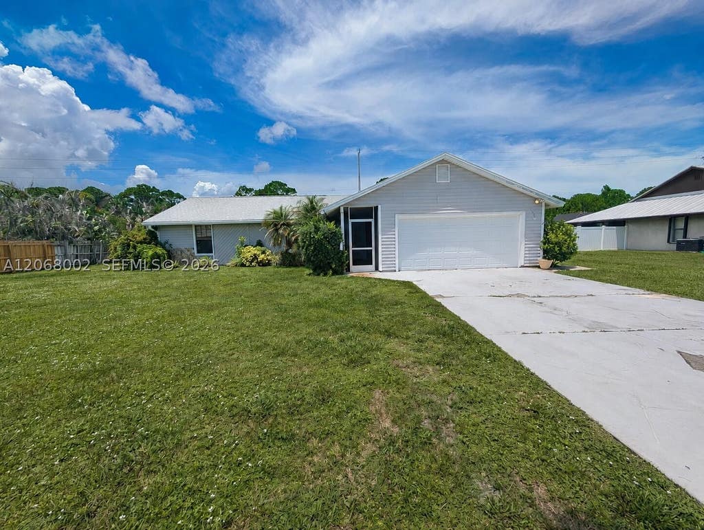 Photo of 5601 Paleo Pines Cir, Fort Pierce, FL 34951 (MLS # A12068002)