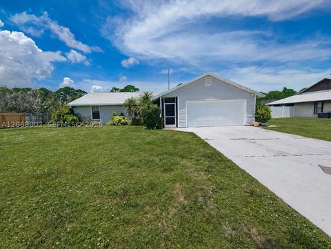 Photo of 5601 Paleo Pines Cir, Fort Pierce, FL 34951 (MLS # A12068002)