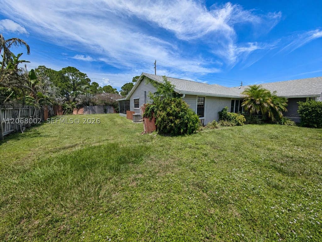 Photo of 5601 Paleo Pines Cir, Fort Pierce, FL 34951 (MLS # A12068002)