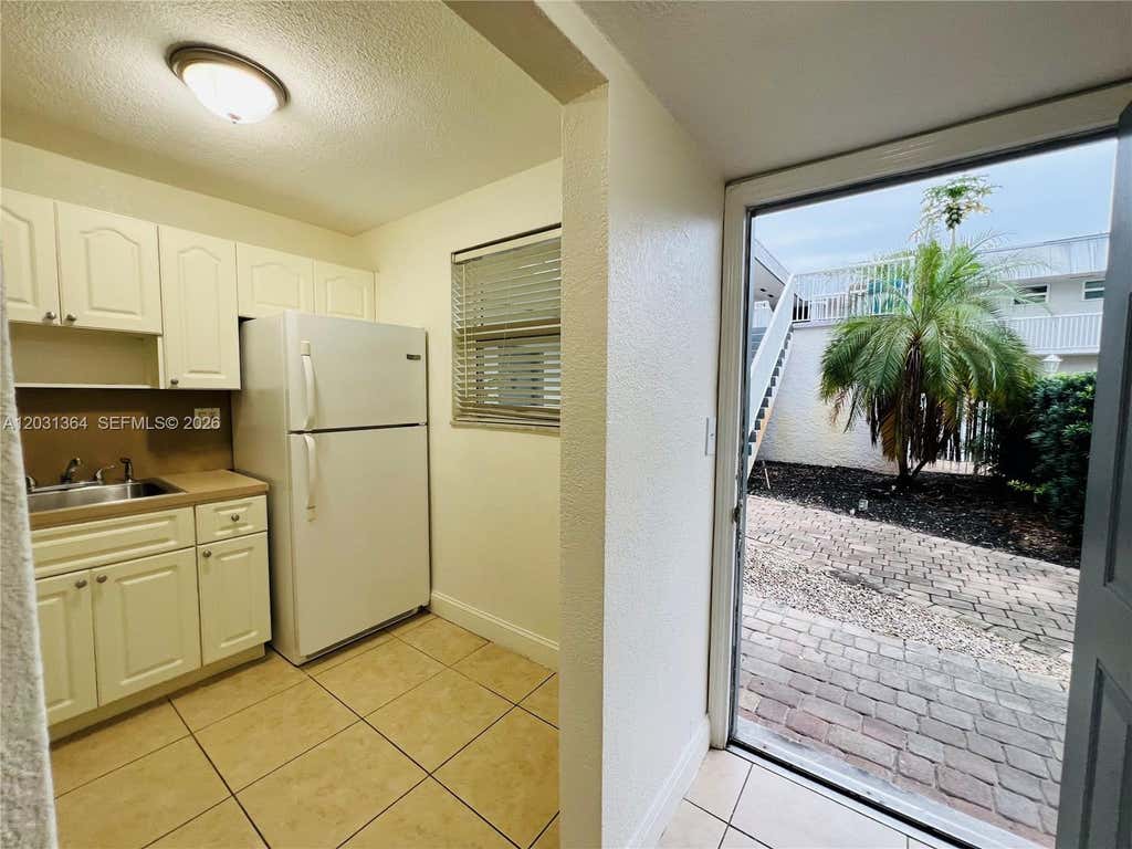 Photo of 2040 NW 89th Ave #104, Pembroke Pines, FL 33028 (MLS # A12031364)