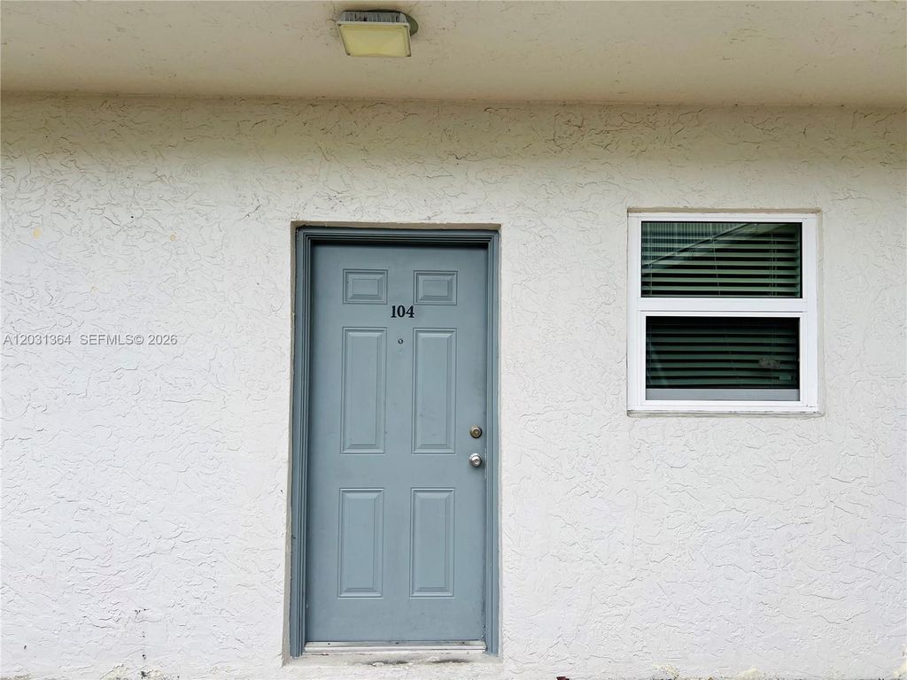 Photo of 2040 NW 89th Ave #104, Pembroke Pines, FL 33028 (MLS # A12031364)