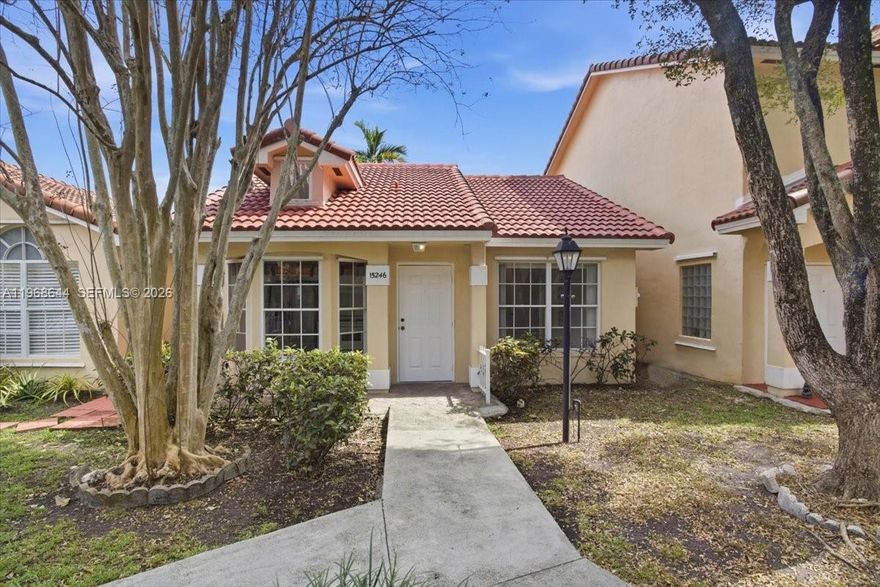 Welcome to this charming 2-bedroom, 2-bath townhouse-style home located in the gated Jasmine community within The Hammocks. Designed for comfort and ease, this residence features high ceilings that create an open, airy feel throughout the main living spaces. Both bedrooms offer generous closet space, and new flooring and fresh paint add a crisp, updated touch. Natural light pours in, enhancing the home’s spacious layout. Step outside to your own private back patio—perfect for relaxing. The unit includes a washer and dryer for added convenience and comes with one assigned parking space, plus ample guest parking for visitors. The roof was installed in 2021, offering added peace of mind. Centered around a tranquil courtyard, the community creates a welcoming neighborhood atmosphere. Ideal as a starter home or a smart addition to an investment portfolio, this property offers comfort, privacy, and convenience within a well-maintained gated community.