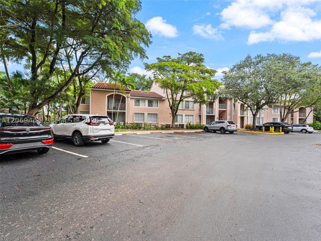 Photo of 12106 Saint Andrews Pl #202, Miramar, FL 33025 (MLS # A12069444)
