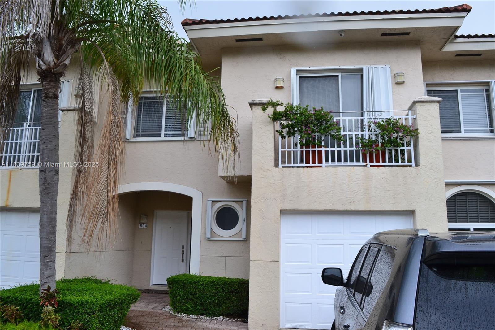 Welcome to this spacious and well-maintained two-story townhome located in the exclusive, gated community of Tiffany of Kendall. This residence features a one-car garage, in-unit washer and dryer, and modern stainless steel appliances. Enjoy easy access to the Florida Turnpike, SR 874, and 826. The interior boasts elegant tile flooring throughout, a generous primary bedroom with soaring ceilings, a large walk-in closet, and a luxurious ensuite bath with dual sinks. The kitchen flows seamlessly to a charming patio—perfect for outdoor dining and entertaining. Additional highlights include accordion hurricane shutters for peace of mind.