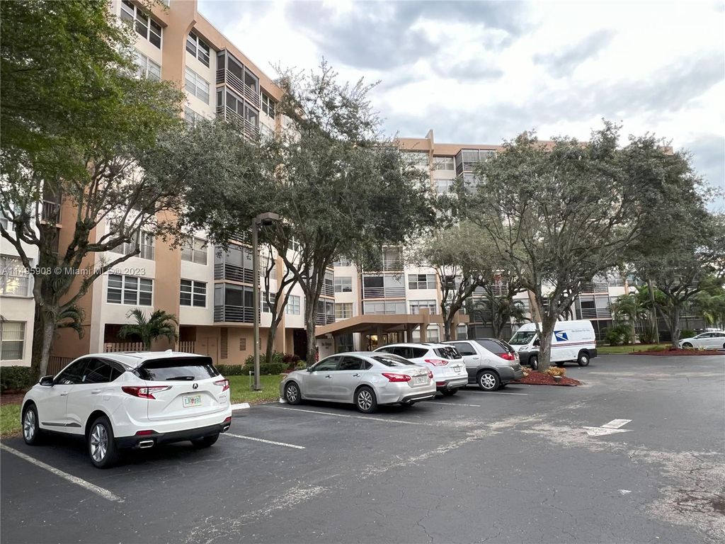 Photo of 1300 Saint Charles Pl #322, Pembroke Pines, FL 33026 (MLS # A11495908)
