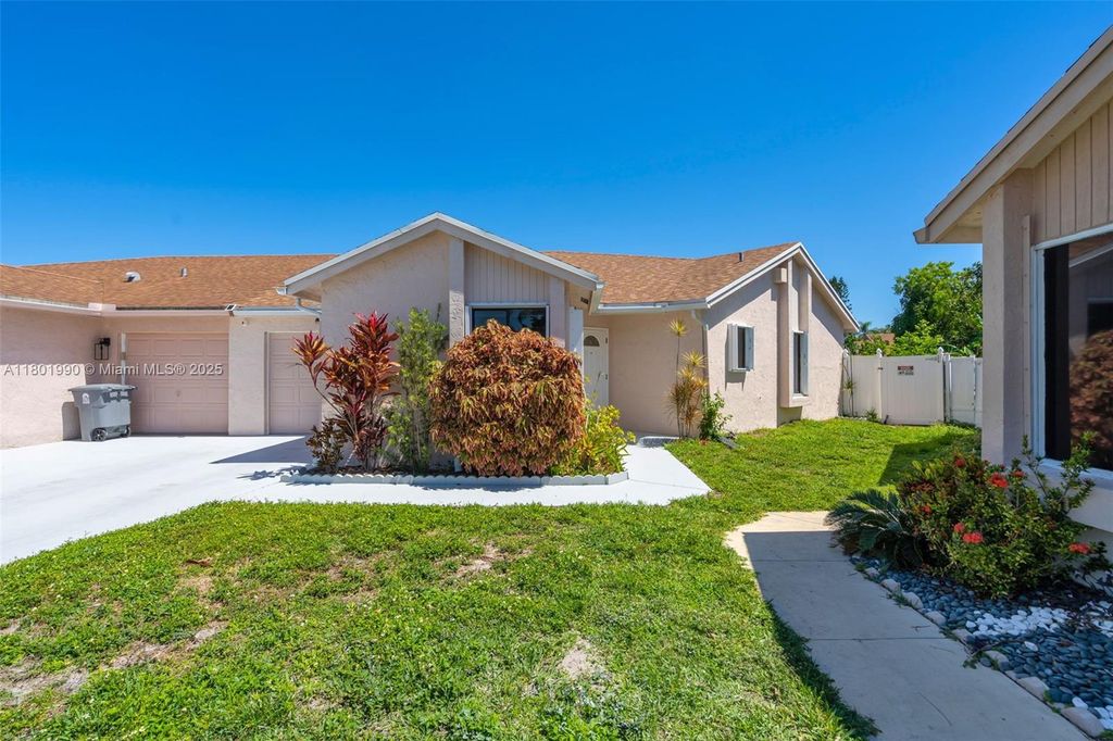 Photo of 21887 Rainberry Park Cir, Boca Raton, FL 33428 (MLS # A11801990)