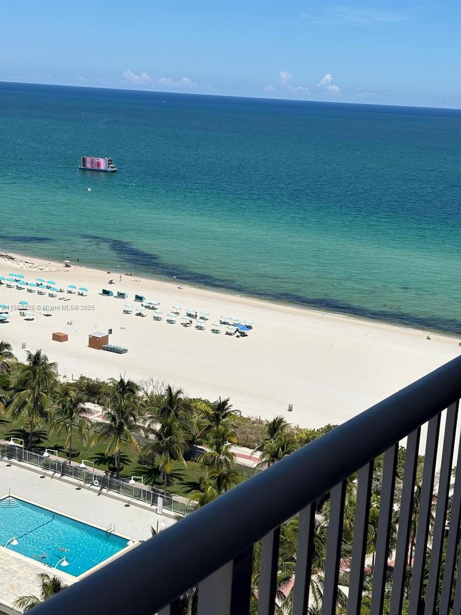 Best price for a high floor unit with ocean & bay views right on the beach! IMPACT WINDOWS. Huge 1,122 sqft 2- BR, 1.5-bath with renovated baths Freshly painted with a large balcony offering direct ocean sunrise views. Impact windows & doors ensure safety. Enjoy resort-style amenities: 24 hr security on-site gym, pool, sauna, bicycle storage, & community room, covered garage parking. A short walk on the beach to the Faena cultural, Lincoln Road, Ocean Dr, & more. A short drive to Downtown Miami, Brickell, and the Design District/Wynwood Art District. Great investment with a rental minimum of 90 days per year and immediate rental availability. The 2024 budget is approved with full reserves. Best price unit, check COMPS!! service pets OK. SPECIAL ASSESSMENTS ALL PAID!