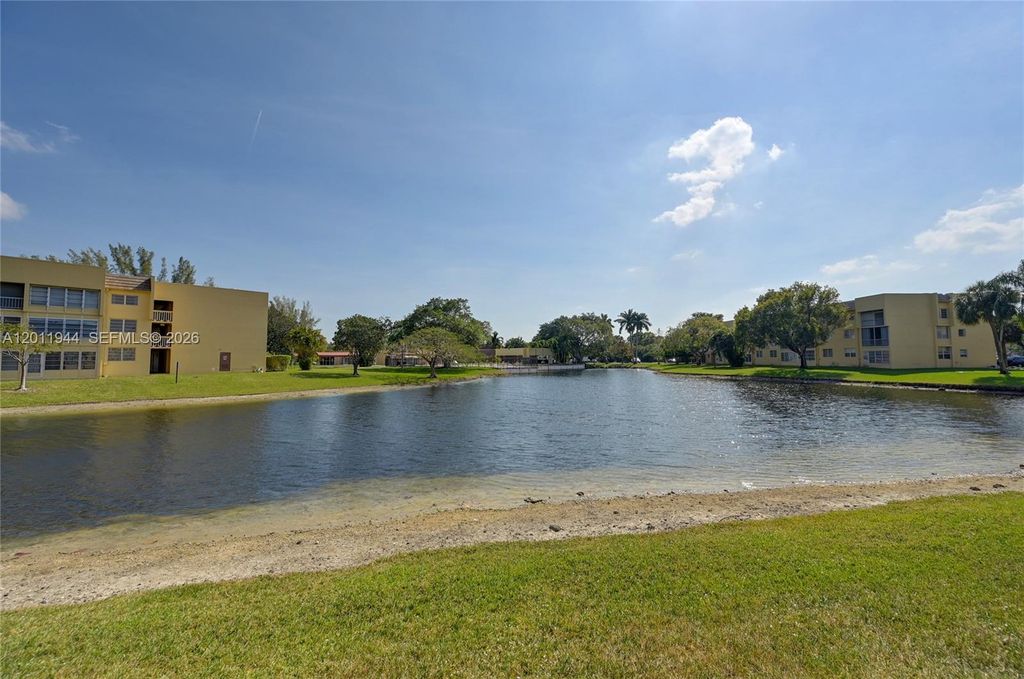 Photo of 5860 NW 64th Ave #102, Tamarac, FL 33319 (MLS # A12011944)