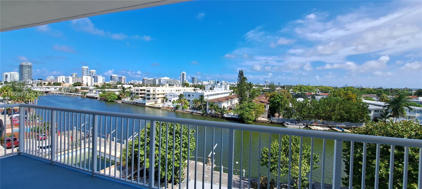 Amazing Waterfront Unit, Island Living, Nestled at 130 South Shore Drive in the serene neighborhood of North Beach, this charming 2-bedroom, 1.5-bath home, offers picturesque views of both a tranquil bay and a scenic canal. The residence features newly appliances, a modern kitchen, and completely renovated bathrooms, blending contemporary comfort with the beauty of waterfront living. Whether you're relaxing in the living area or enjoying the fresh air on your balcony, the stunning water views provide a constant reminder of your peaceful and idyllic surroundings. This home is a perfect retreat for those seeking a blend of modern and natural beauty. Walking distance to the beach and night life, walking distance to supermakets.