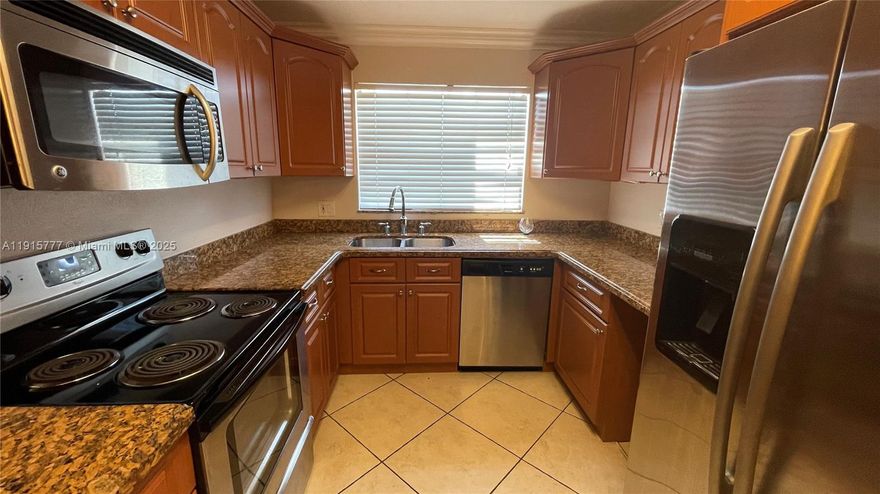 Welcome Home! Amazing 3bed 2.5bath 2 story remodeled townhome is waiting for you to call yours! Large kitchen with Granite countertops, Stainless Steel appliances, Tile & laminate flooring throughout, and so much more! Open concept is perfect for entertaining. Full sized walk-in closet in the Primary Bedroom. laundry room with washer & dryer on the first floor. Patio with a view of the lake. Property comes with 2 assigned parking spaces and ample guest parking. Community pool and tennis courts are available. Brand new hurricane impact windows for your piece of mind and energy saving. Brand new roof.