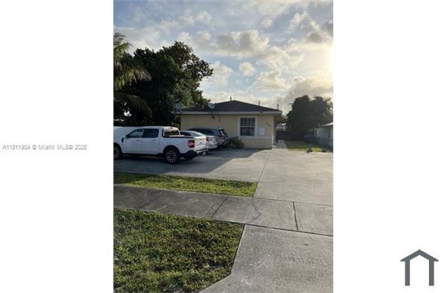 Built year 2004 DUPLEX. 3/2 AND 2/1. BOTH HAVE Laundry room with w/d hookup. Separate Water and Electric Meter. Tenant pays all utilities. CENRAL A/C and All Tiled. NICE LARGE BACKYARD.3/2 unit newly painted and ready to move-in. Closer to hws school college hard rock area in quiet neighborhood. Priced to Sell. Please DO NOT DISTURB TENANTS
